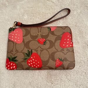 COACH Strawberry Wristlet